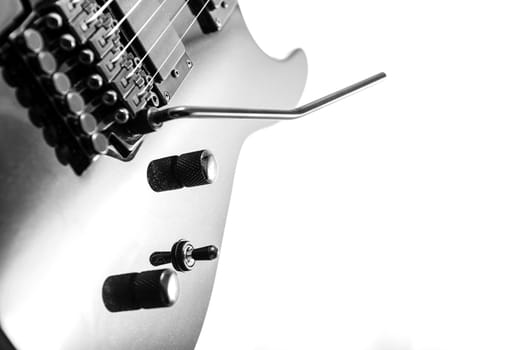 Electric guitar detail shots over white backdrop