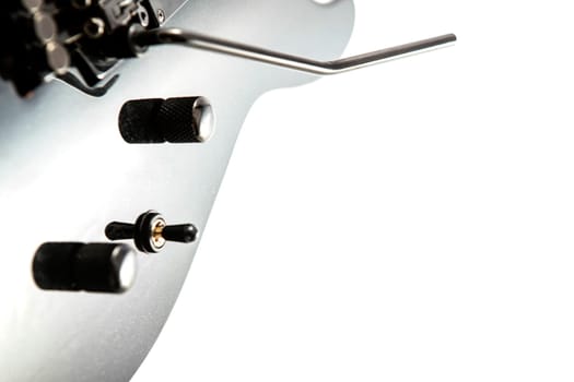 Electric guitar detail shots over white backdrop
