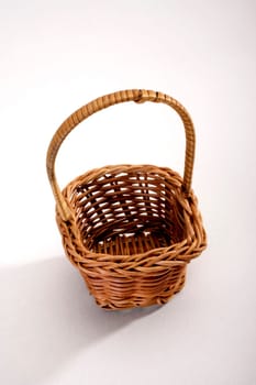 close up shot of empty baskets on white background
