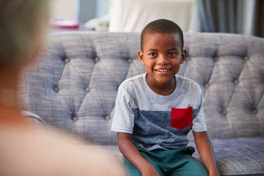 Young boy having therapy with a child psychologist