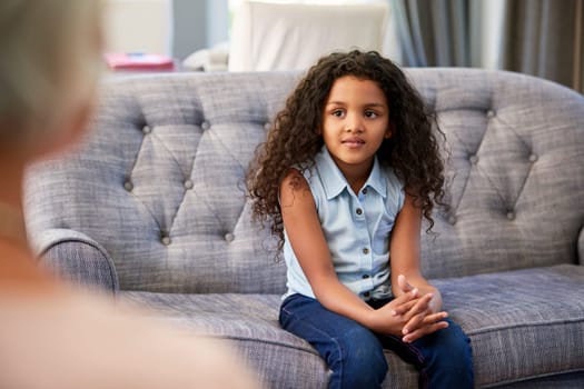 Young girl having therapy with a child psychologist