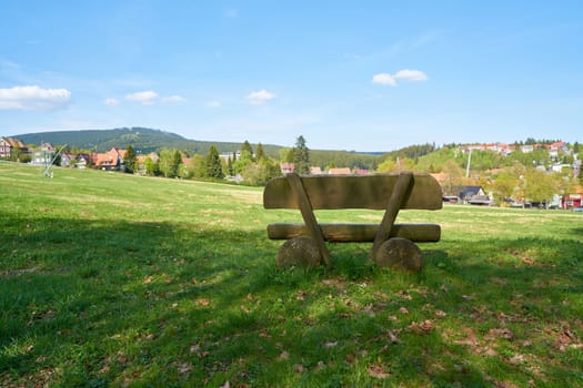 Bank on a hiking trail in the village of Braunlage in the Harz National Park