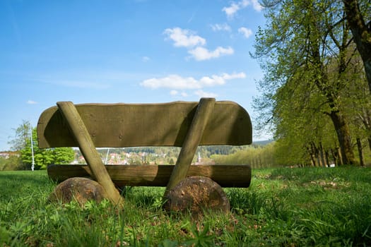 Bank on a hiking trail in the village of Braunlage in the Harz National Park