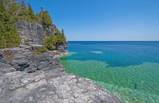 Colorful Cliffs above and Below the Water on Lake Huron in Bruce Peninsula National Park in Ontario, Canada