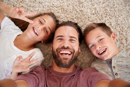 Point Of View Shot Of Father And Children Posing For Selfie