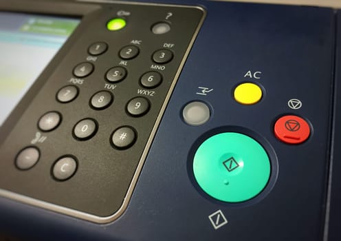 control panel with colored buttons of an office photocopier