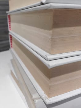 Close-up of a stack of books. Ideal for concepts and backgrounds.