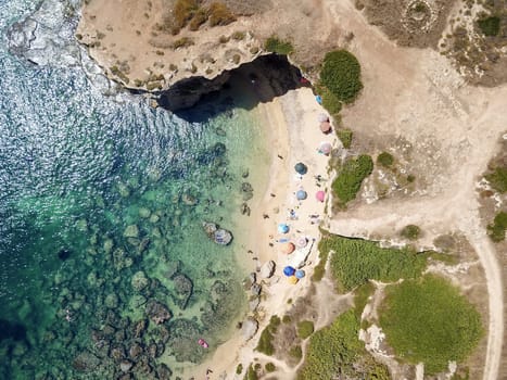 Aerial View of a beautyful Sandy Beach and Sea with turquoise water