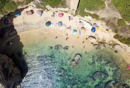 Aerial View of a beautyful Sandy Beach and Sea with turquoise water
