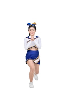 Attractive asian cheerleader in action posing isolated over white background