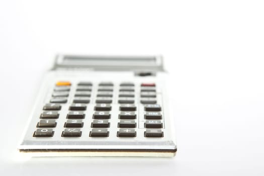 Retro scientific calculator over a white background