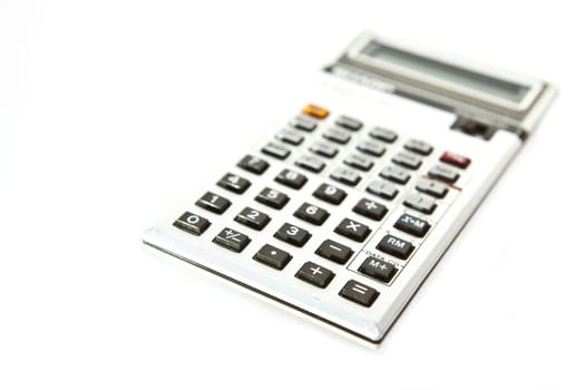 Retro scientific calculator over a white background