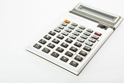 Retro scientific calculator over a white background