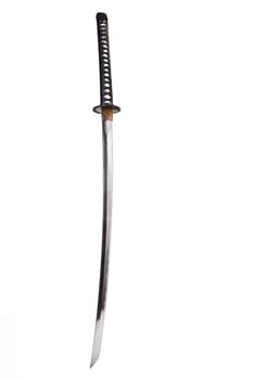 Detail from the very sharp steel blade on a Japanese Samurai sword or Katana.  The blade has to be constantly kept waxed to protect against oxidization and to retain sharpness.