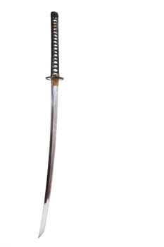 Detail from the very sharp steel blade on a Japanese Samurai sword or Katana.  The blade has to be constantly kept waxed to protect against oxidization and to retain sharpness.