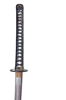 Detail from the very sharp steel blade on a Japanese Samurai sword or Katana.  The blade has to be constantly kept waxed to protect against oxidization and to retain sharpness.