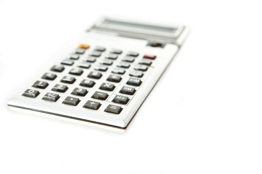 Retro scientific calculator over a white background