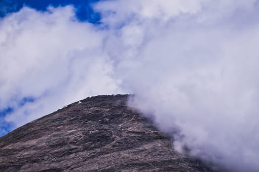 Mountain peaks with source clouds,peaks of the mountains shrouded in clouds