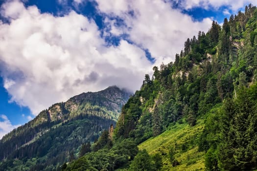 Hohe Tauern mountain landscape,Alps in Austria with source clouds