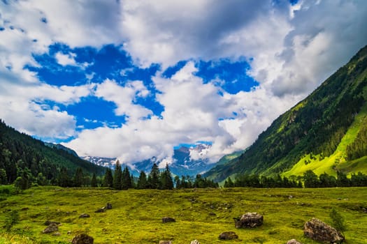 Hohe Tauern mountain landscape,Alps in Austria with source clouds