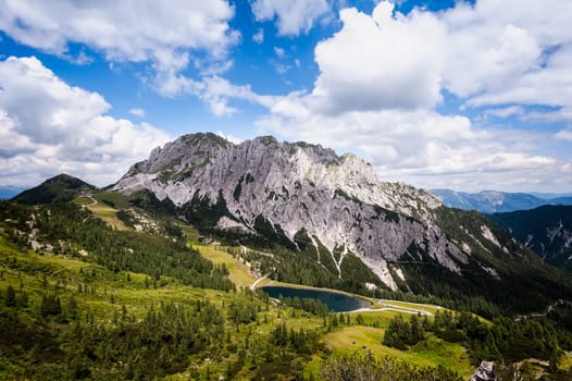 High angle panoramic view of the  Julian alps in summer, as seen from passo Pramollo on the border between Italy and Austria. Mountain Landscape.