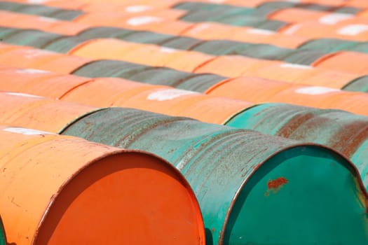 red and green lying metal drums,Germany,Europe