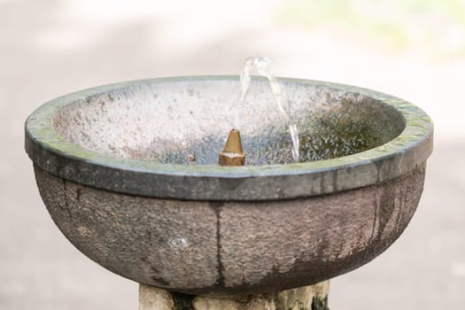 Concrete water fountain in the city park