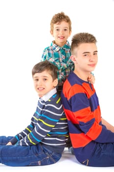 Shot studio with three brothers on white background