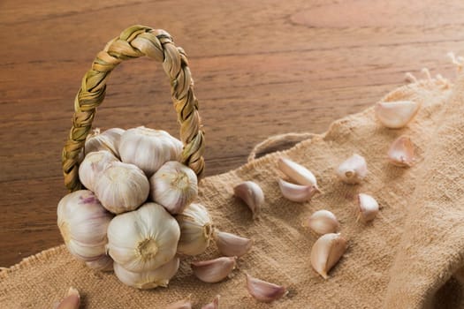 Organic garlic on wood table