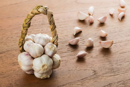 Organic garlic on wood table