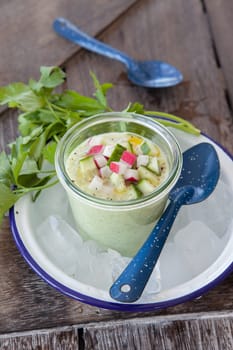 Refreshing cold cucumber soup on ice
