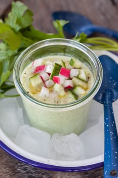 Refreshing cold cucumber soup on ice