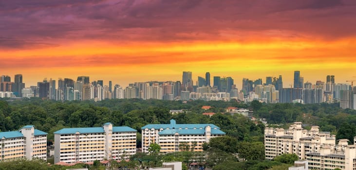 Singapore apartment housing estate with downtown city skyline view during sunset panorama