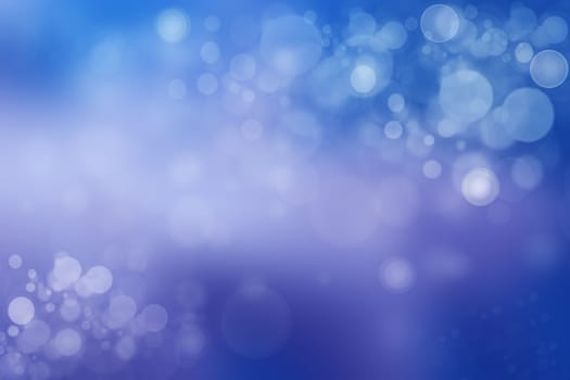 Abstract blue bokeh background with colorful circles. Beautiful texture.