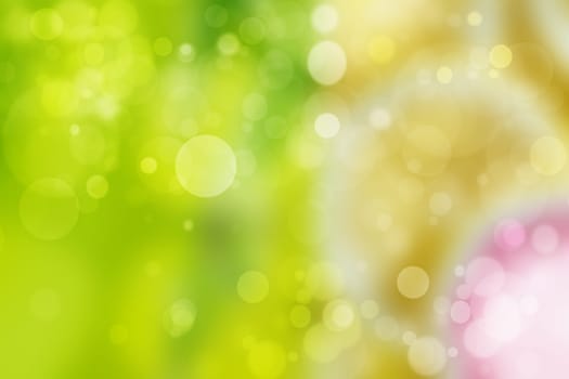 Abstract colorful gradient green yellow bokeh lights background texture.