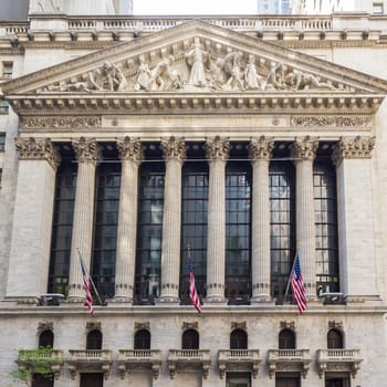 Exterior of New york Stock Exchange, largest stock exchange in world by market capitalization and most powerful global financial institute. Wall street, lower Manhattan, New York City, USA.