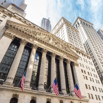 Exterior of New york Stock Exchange, largest stock exchange in world by market capitalization and most powerful global financial institute. Wall street, lower Manhattan, New York City, USA.