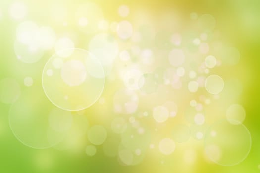 Abstract green light and yellow colorful summer bokeh background.