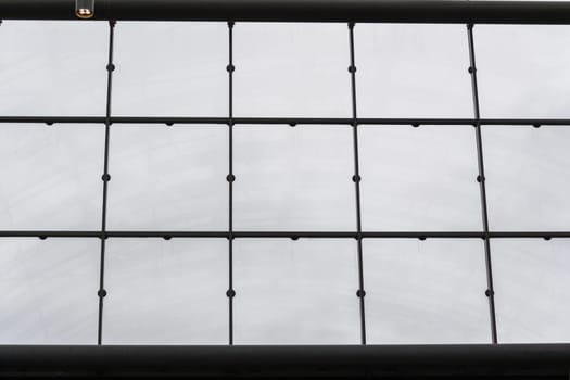 Modern office building with glass facade as a background.