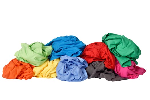 Stack of dirty clothes laundry isolated over white background
