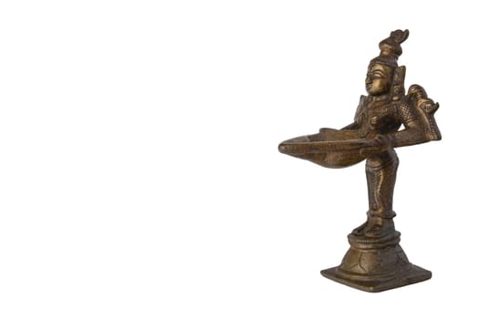 Hindu god. Standing antique Hindu god bronze figure with a bowl isolated on white background.