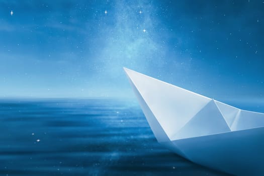 Sailboat paper sailing on the water with night scene background. Columbus day concept