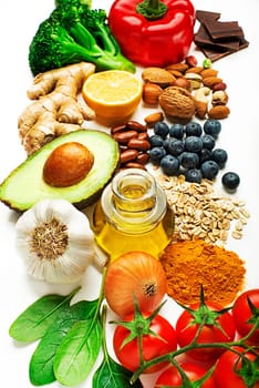 Healthy food selection with fruits nuts and vegetables. Healthy diet foods for heart cholesterol and diabetes.