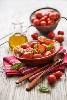 Salad with cherry tomatoes. Home made food. Concept for a tasty and healthy meal.