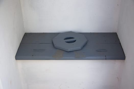 Traditional Dutch toilet in a windmill at Kinderdijk, the Netherlands.
