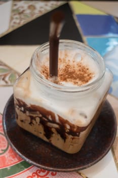 Iced coffee mocha serving on table, stock photo