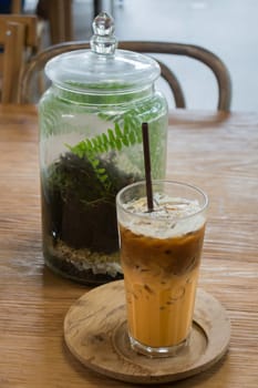 Glass of iced milk tea and espresso, stock photo