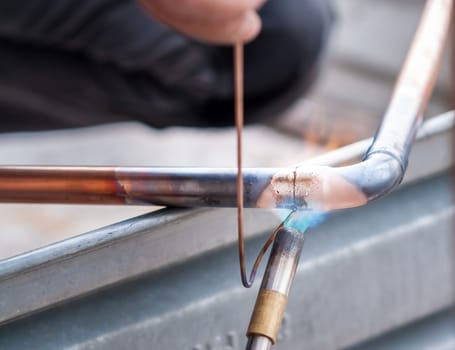 Welding of copper pipe of a methane gas pipeline or of a conditioning or water system.