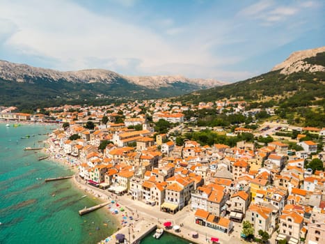 Aerial panoramic view of Baska town, popular touristic destination on island Krk, Croatia, Europe.