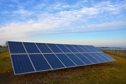 Solar power plant - concept for electricity and ecological industry. High energy prices. Clean energy and environment. power full of natural energy.
